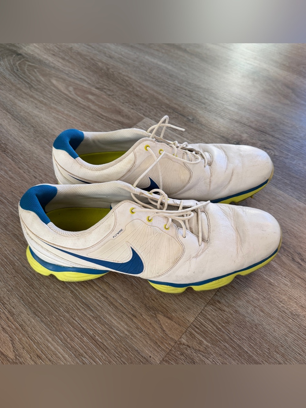 Nike Men’s White Golf Shoes with Blue & Yellow Accents